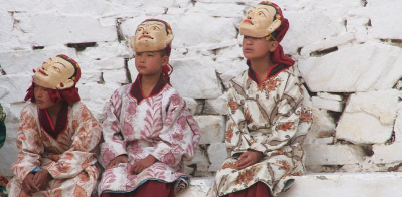 three bhutan monks