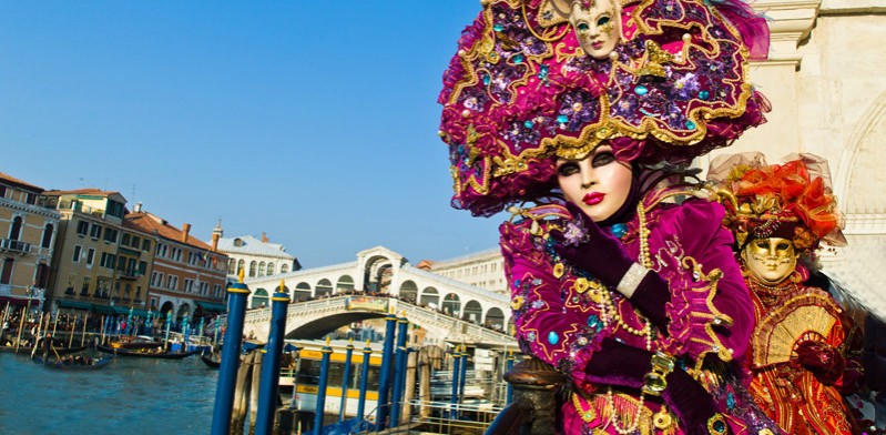 two people dressed up for venice carnivale