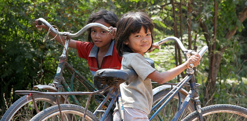 two children with bikes