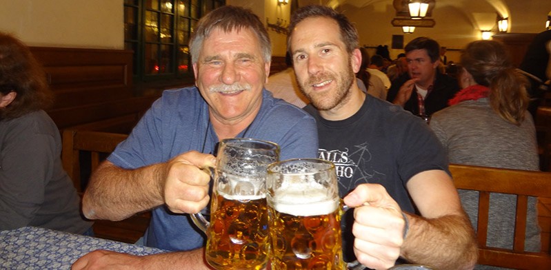 adam rozenbachs and another guy drinking beer