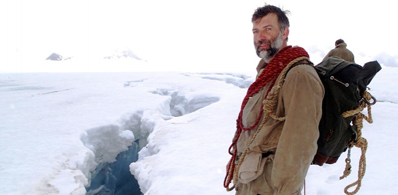 Tim Jarvis standing amongst snow