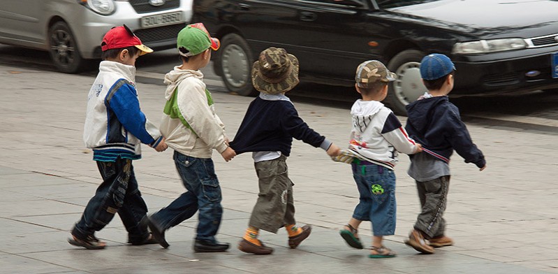 Looking after little friends in Vietnam photo by Jason Cathcart