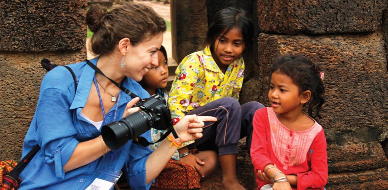 intrepid passenger talking with local children