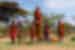 Local Maasai villagers jumping for traditional performance in colourful robes in Tepesua Village, Kenya
