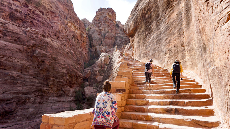 Climbing the stairs at Petra, Jordan