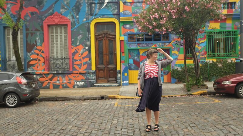 A woman standing on a road in Argentina