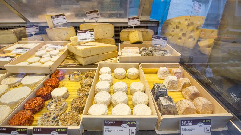 A cheese stall at the market. 