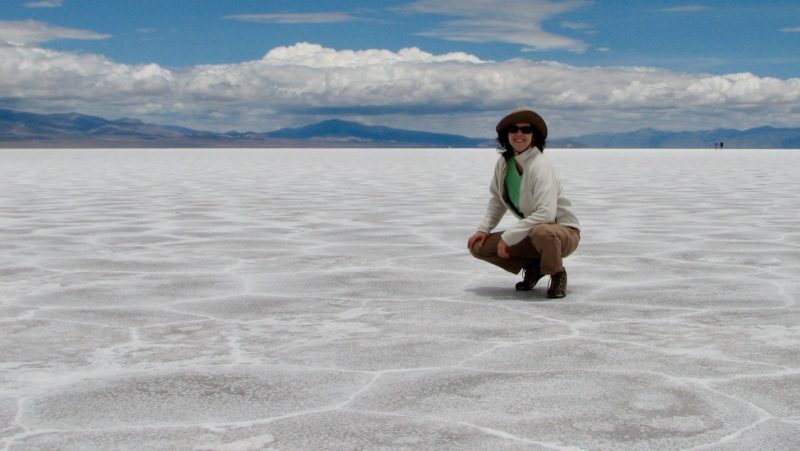A traveller on the Salinas Grandes, a large salt plain in Jujuy province, Argentina