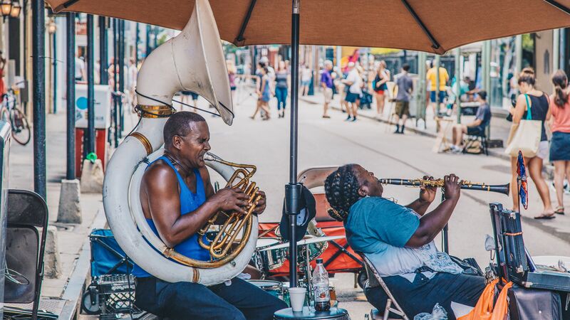 A brass band playing on a street corner in New Orleans