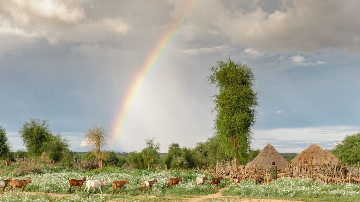 A rainbow over Hamar Village in Turmi, Ethiopia
