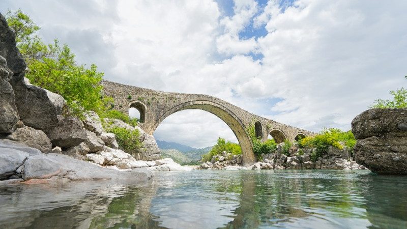 A bridge over a picturesque river in Shkoder, Albania