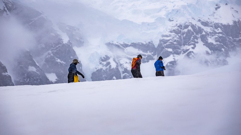 Three travellers in Antarctica