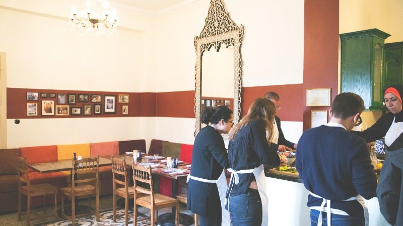 Travellers in the kitchen at Beit Sitti