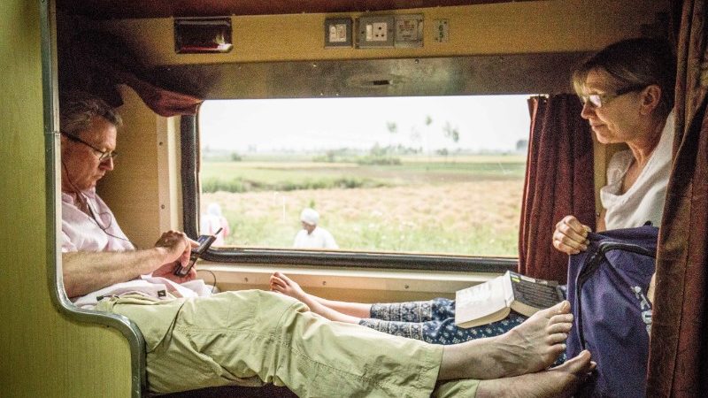 Two travellers on the overnight train in India