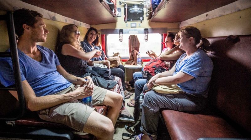 A group of travellers on the train in India