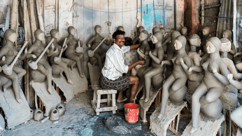 An idol maker in Kumartuli district, Kolkata, India