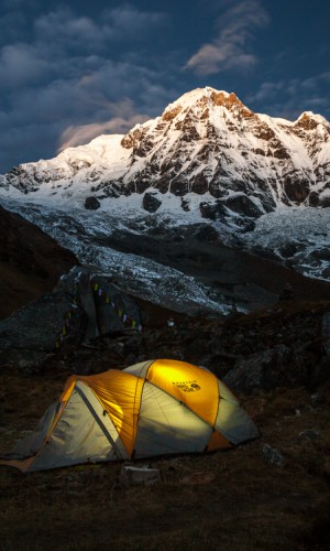 A tent and Annapurna South at sunrise as taken from Annapurna Base Camp