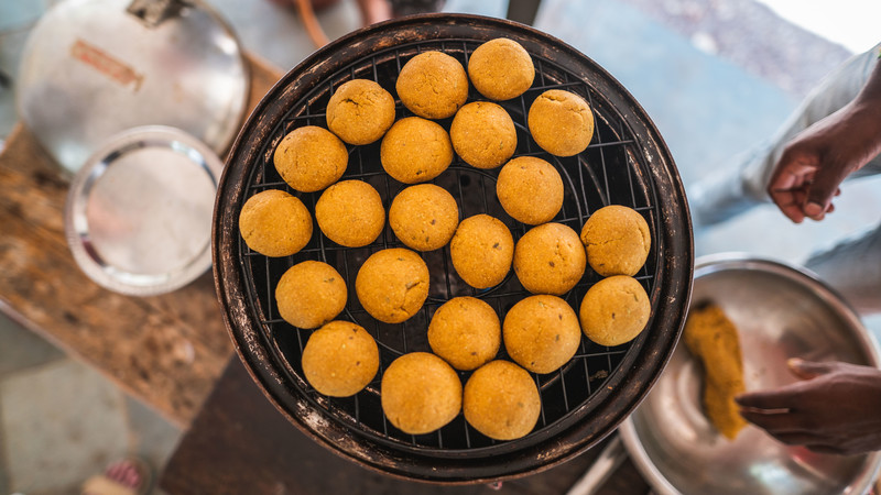 Grill covered in delicious fried Indian food