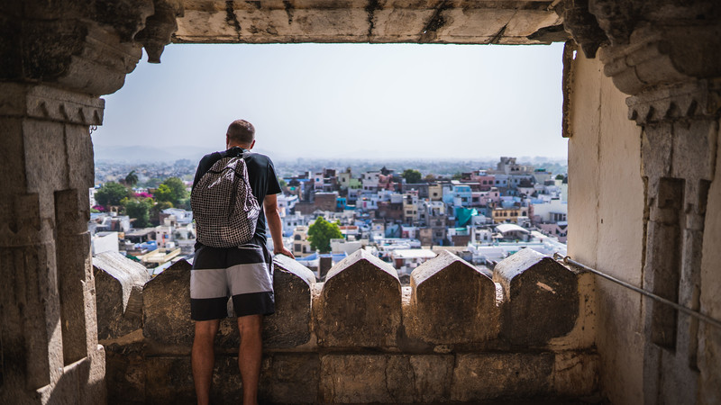 Man looks out over Udaipur, India