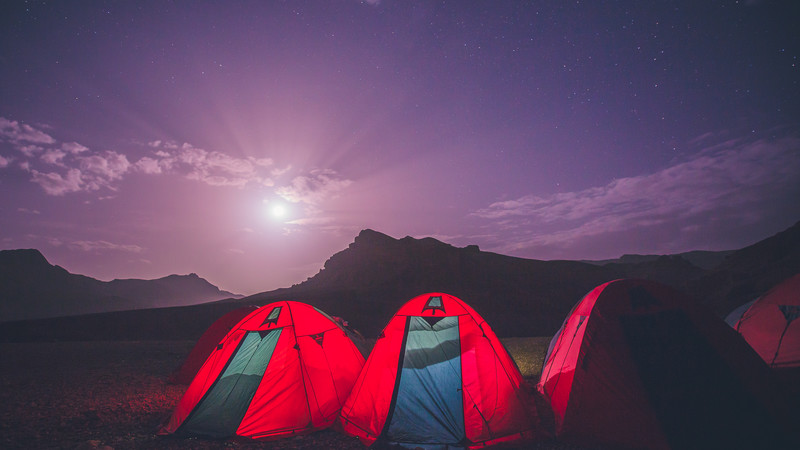 Tents pitched in the moonlight