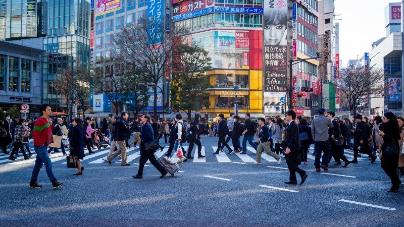 Pedestrians crossing the road in Tokyo