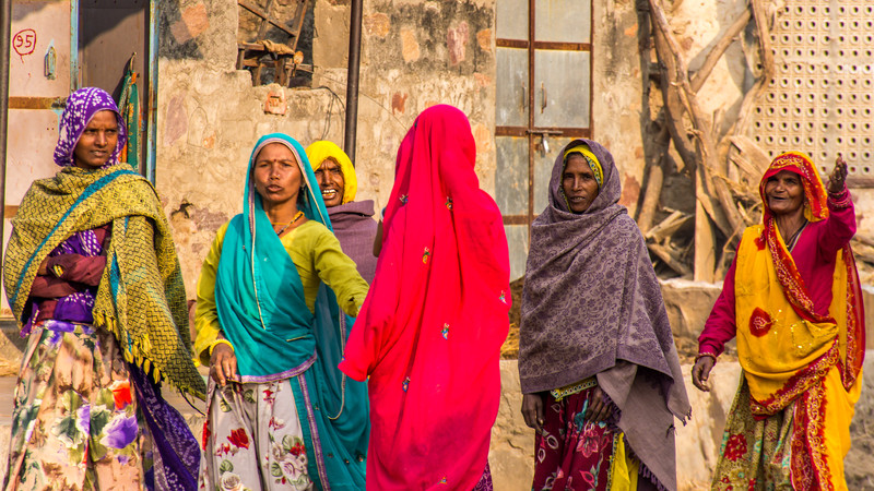 Women wearing colourful saris