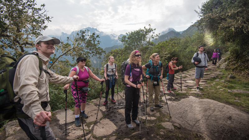 Travellers with hiking poles on the Inca Trail