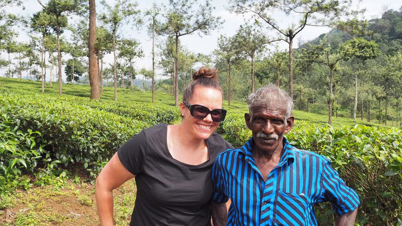 Smiling female traveller and Indian man