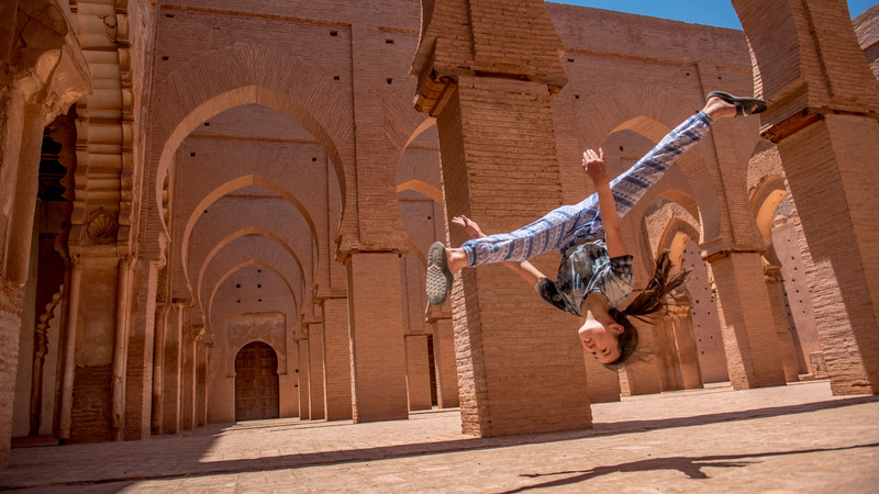 A girl does a flip in Morocco