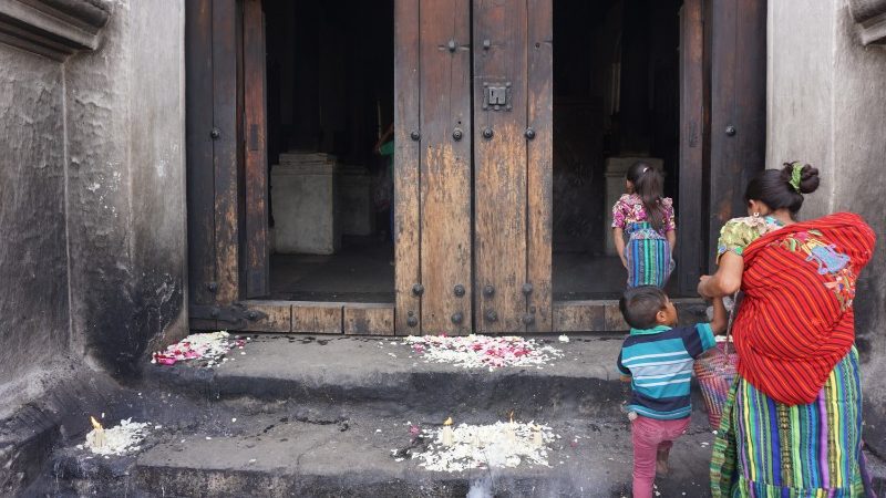 A mother and two kids going to church in Lake Atitlan