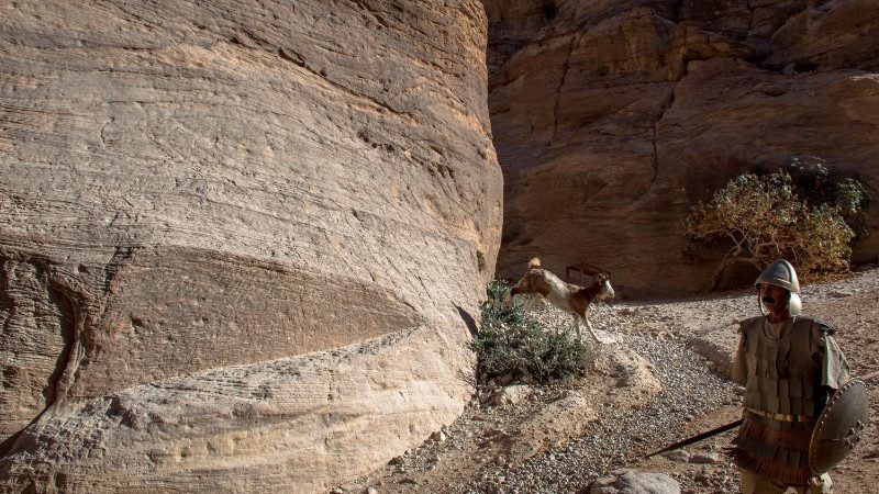 A man dressed in traditional attire in Petra