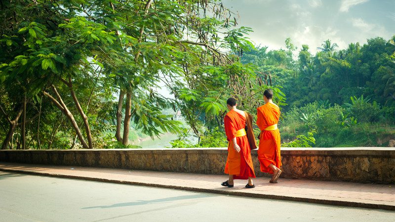 Monks walking in Laos