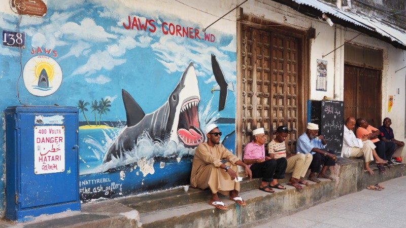 People sitting outside a cafe