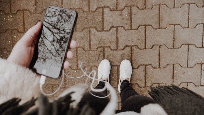 Girl holding mobile phone