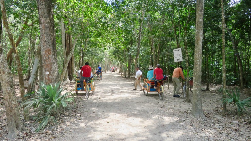 People exploring Coba ruins