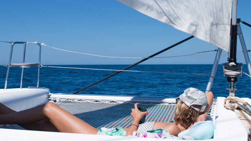 Woman lounging on a boat