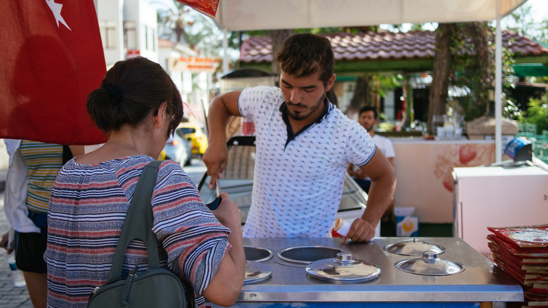 Traveller Buying a Turkish ice cream. 