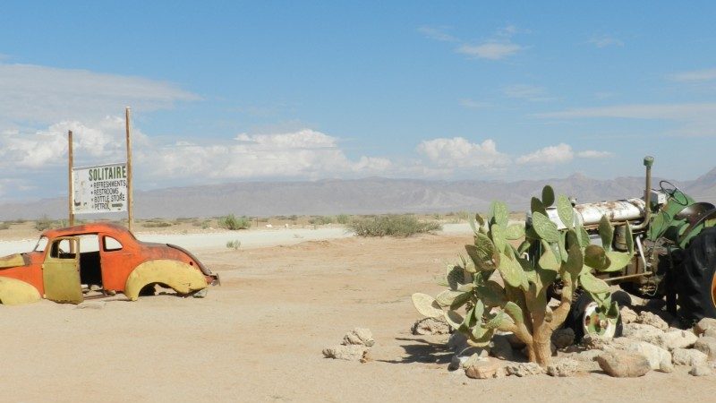 Abandoned car and a cactus in Solitaire, Namibia