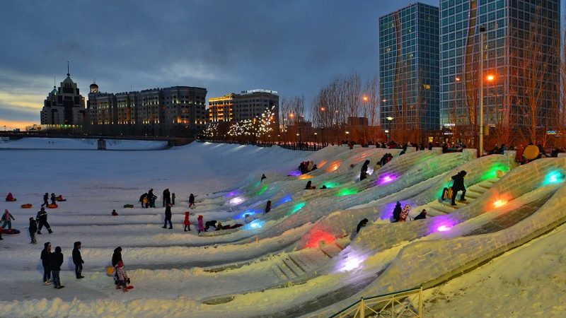 Locals in a snowy Astana square