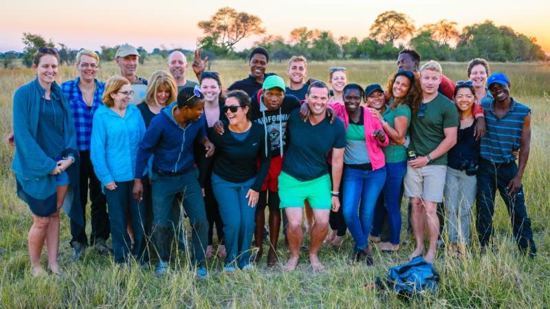 A group of happy travellers in Botswana