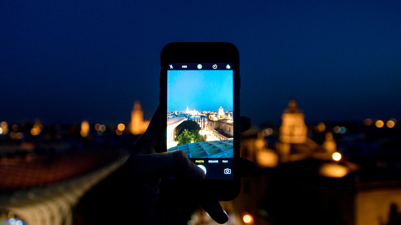 Taking a photo in Seville at night