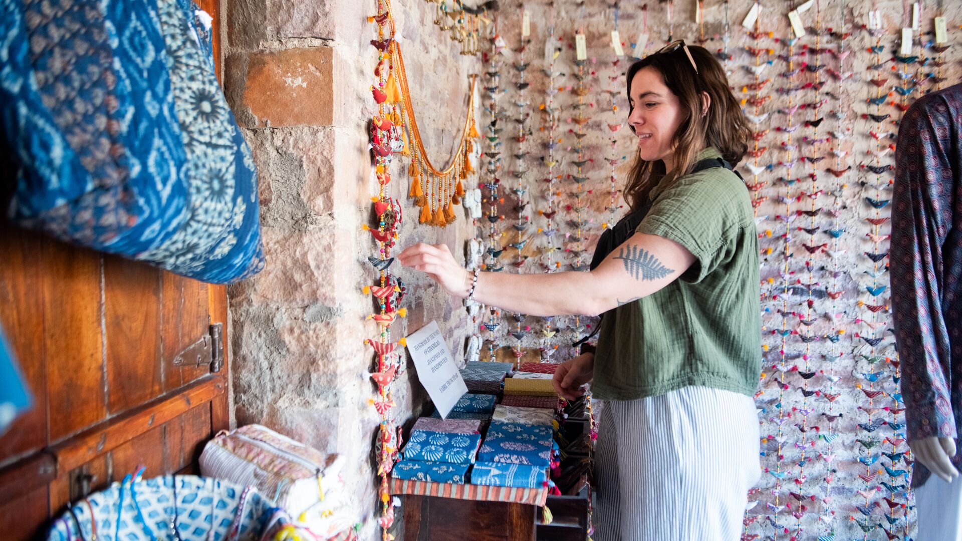 An Intrepid traveller shopping in India.
