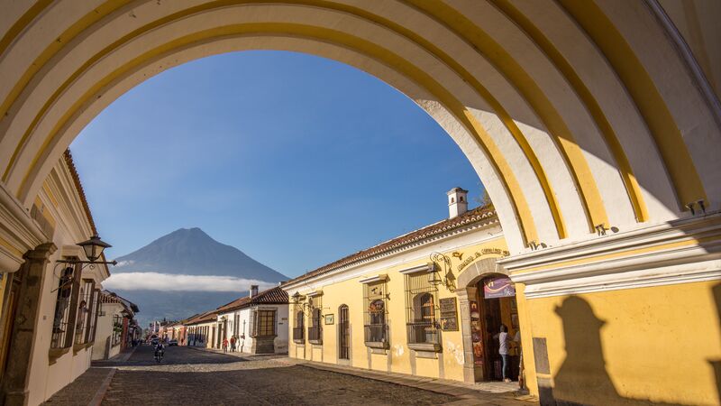 An archway over a cobbled street