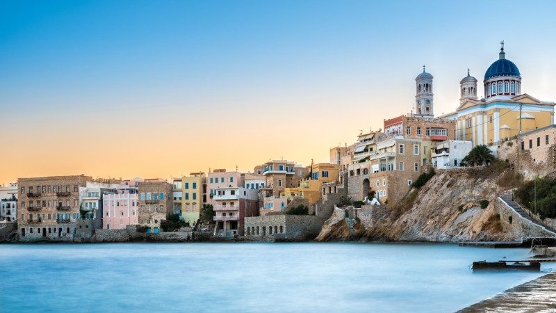 Calm bay and an old village in Greece