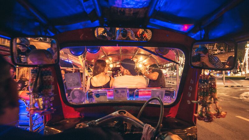 Travellers in a tuktuk in Thailand