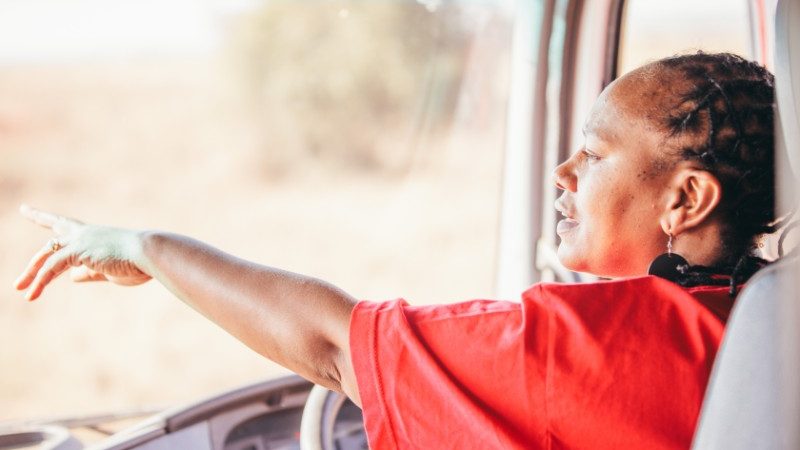 Becky points out the front window of her truck.