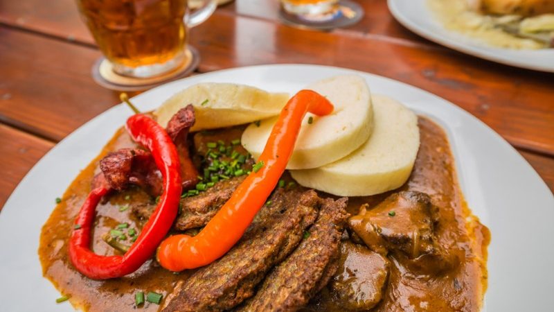 Czech goulash with dumplings and beer