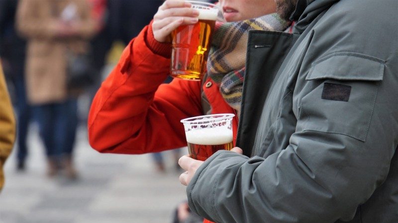 Two people drinking beer