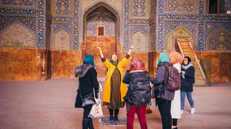 A group of women in a colourful temple in Iran