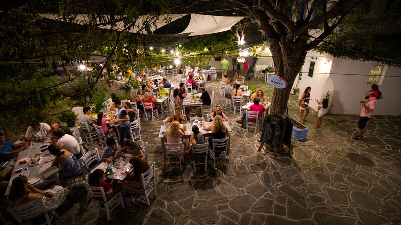 People at a party outside in Greece